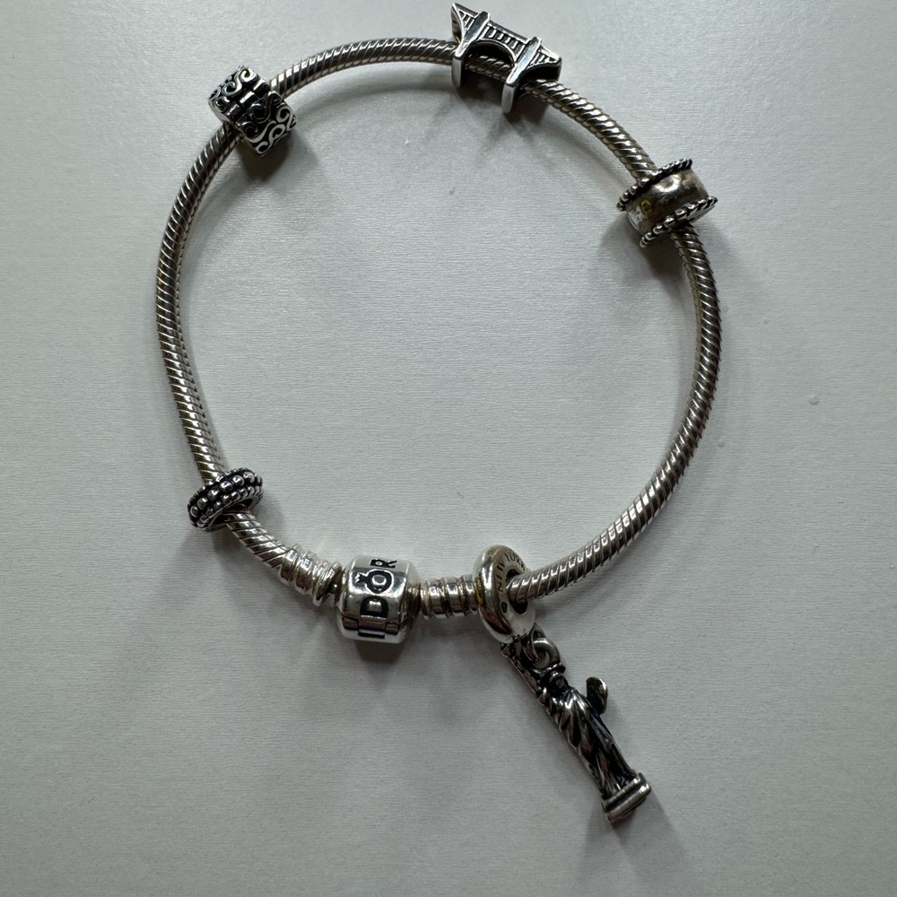 Pandora snake chain Bracelet with a couple charms